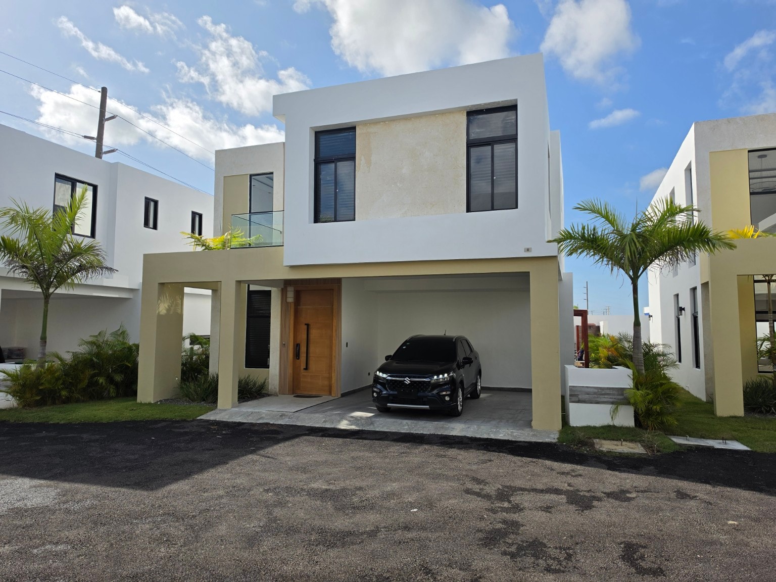 Casa Palma modern exterior with carport